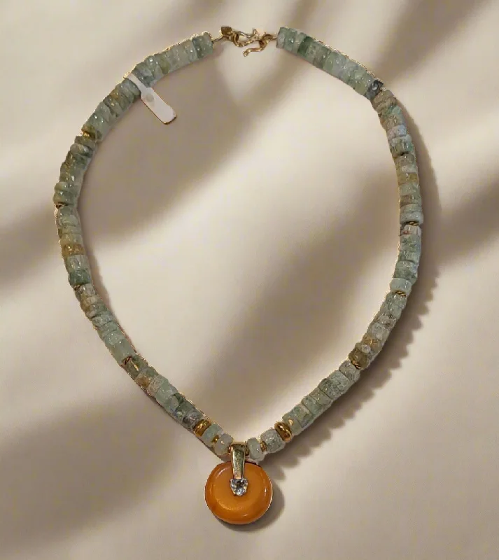 Simple Gold Necklace For Fashionable Look-Necklace with Aquamarine gemstones, Amber medallion with diamonds and gold 18k elements